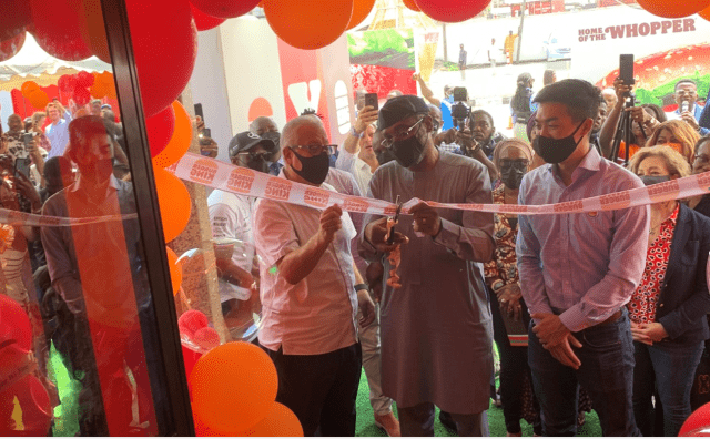 L-R: Burger King Area Franchise Lead for Sub-Saharan Africa, Almu Miguel-Romero; Speaker of the House of Representatives, Honorable Femi Gbajabiamila; with Burger King General Manager for UK, Middle East, and Africa, Robert Lu; during the grand opening of Burger King flagship outlet in Nigeria Source: Business Hallmark